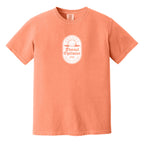 Orange t-shirt with a white, distressed Eternal Optimist Golf Club logo.