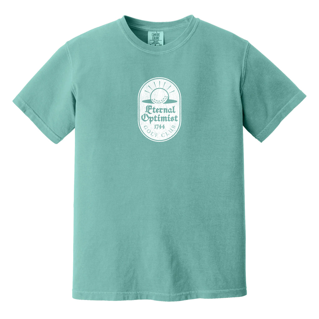 Teal blue t-shirt with a white, distressed Eternal Optimist Golf Club logo.
