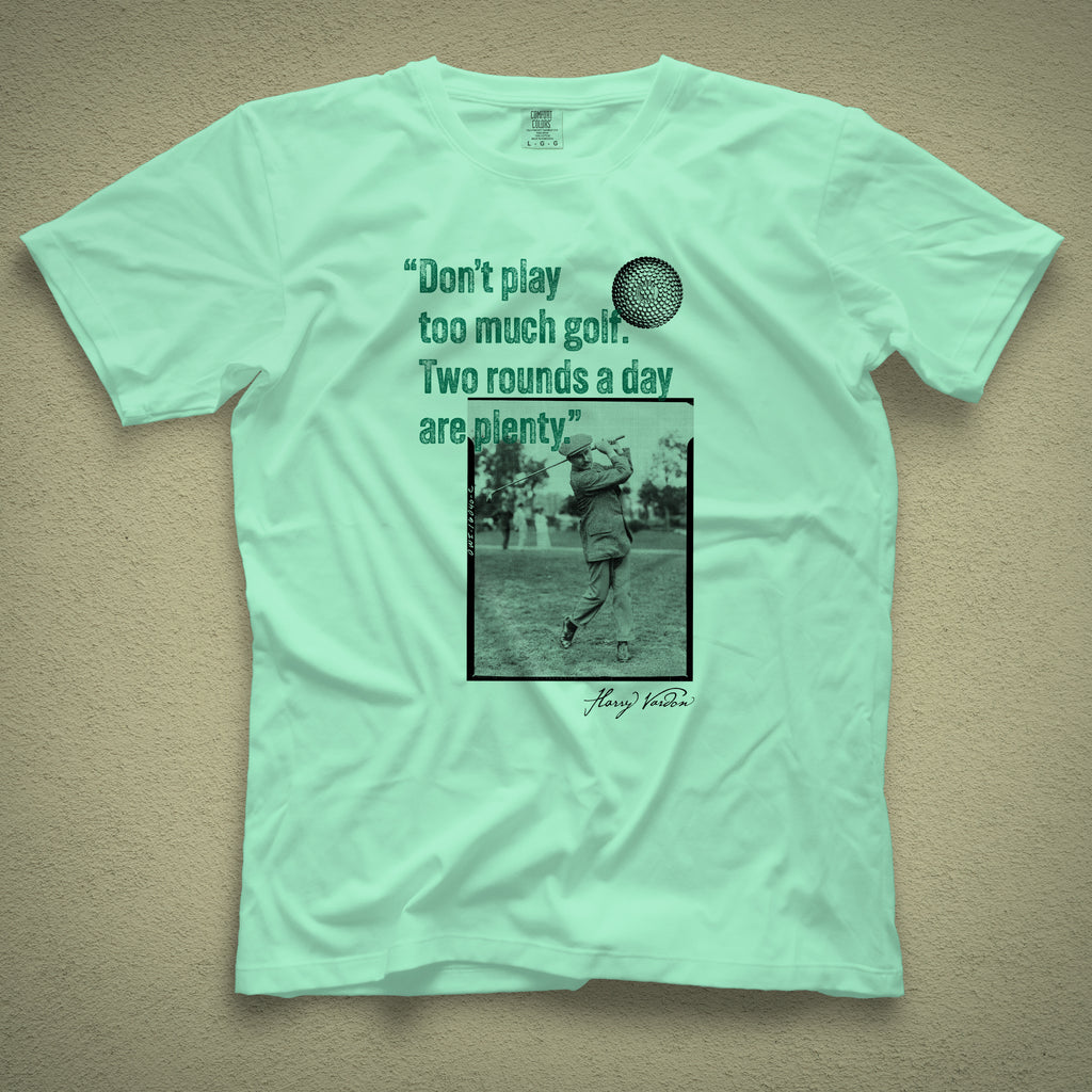 Light green t-shirt with a vintage photo of Harry Vardon along with an old graphic of the Vardon Flyer golf ball. It also has a quote from Vardon: "Don't play too much golf. Two rounds a day are plenty."