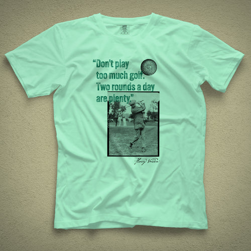 Light green t-shirt with a vintage photo of Harry Vardon along with an old graphic of the Vardon Flyer golf ball. It also has a quote from Vardon: "Don't play too much golf. Two rounds a day are plenty."
